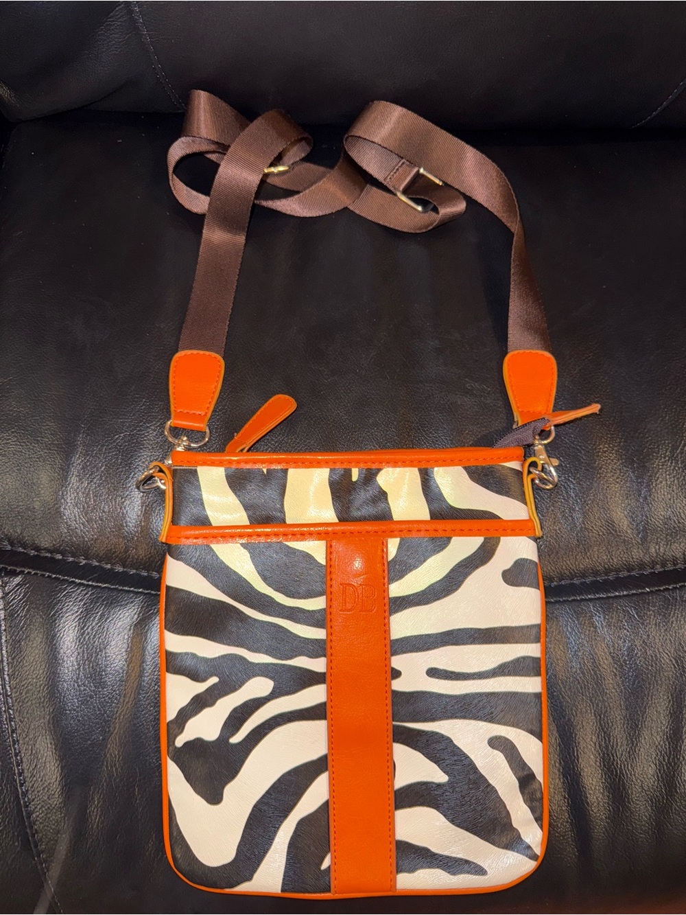 Dooney & Bourke Zebra-Print Crossbody Bag in Orange and Black